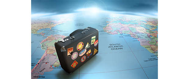 suitcase on globe